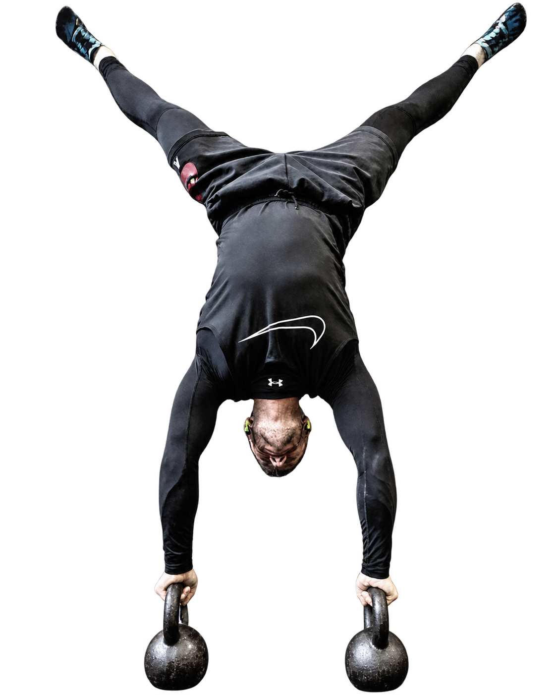 Athlet im Kettlebell-Handstand
