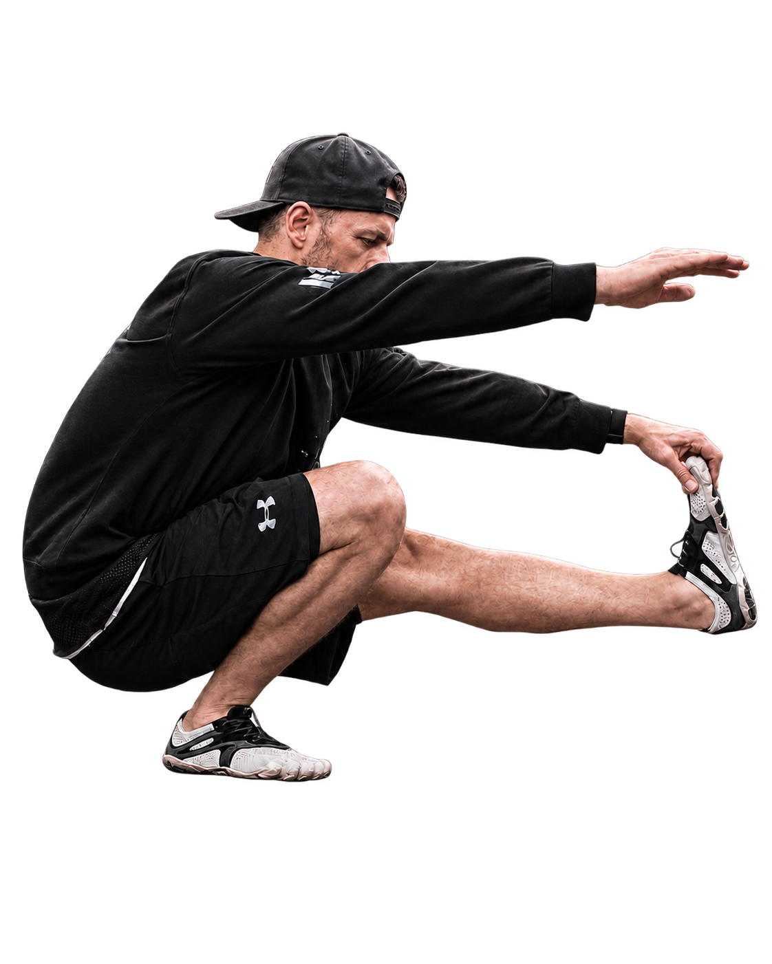 Athlet in tiefer Pistol-Squat-Position